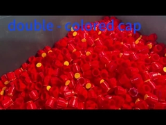 Capsules moulées par injection à deux couleurs